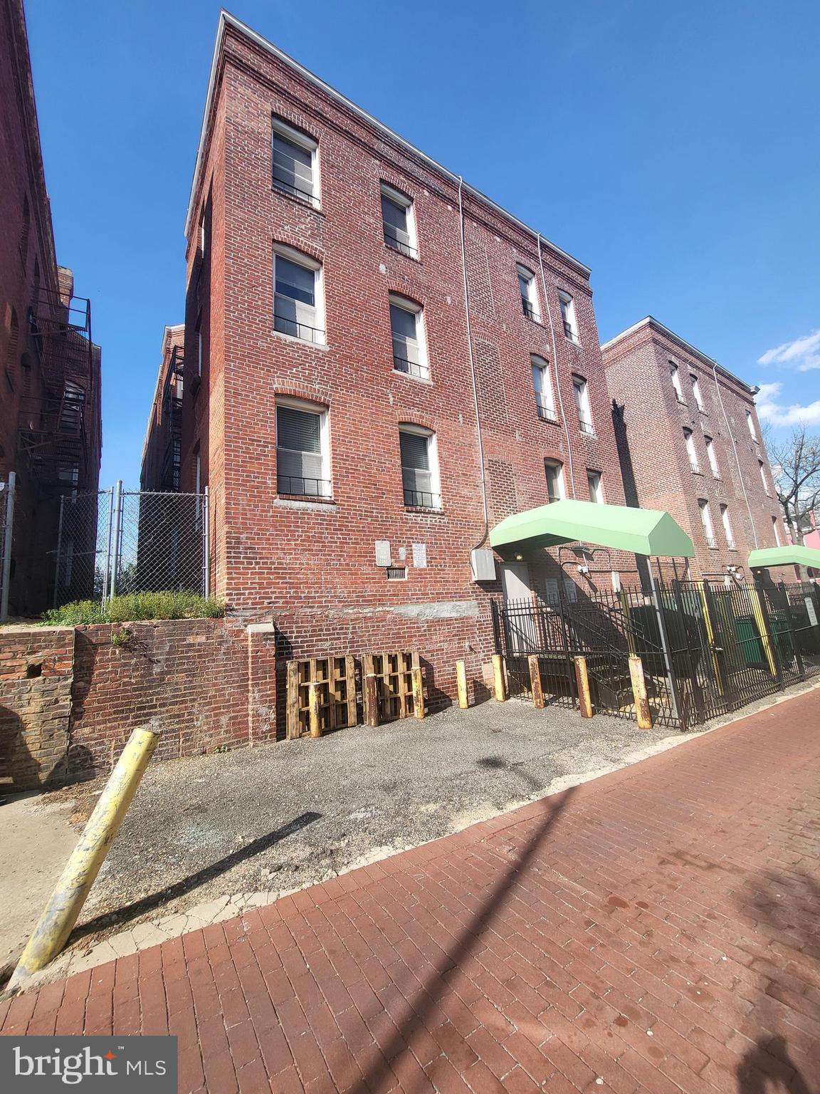 1108 Columbia Road Northwest, Unit 202 Washington, DC 20009 - Photo 2 of 19 a building with a street in the background