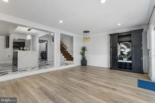 a kitchen with stainless steel appliances granite countertop a stove and a sink