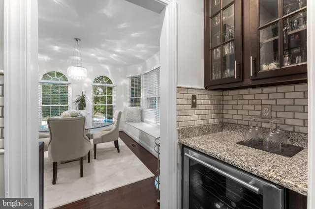a kitchen that has a sink and a stove