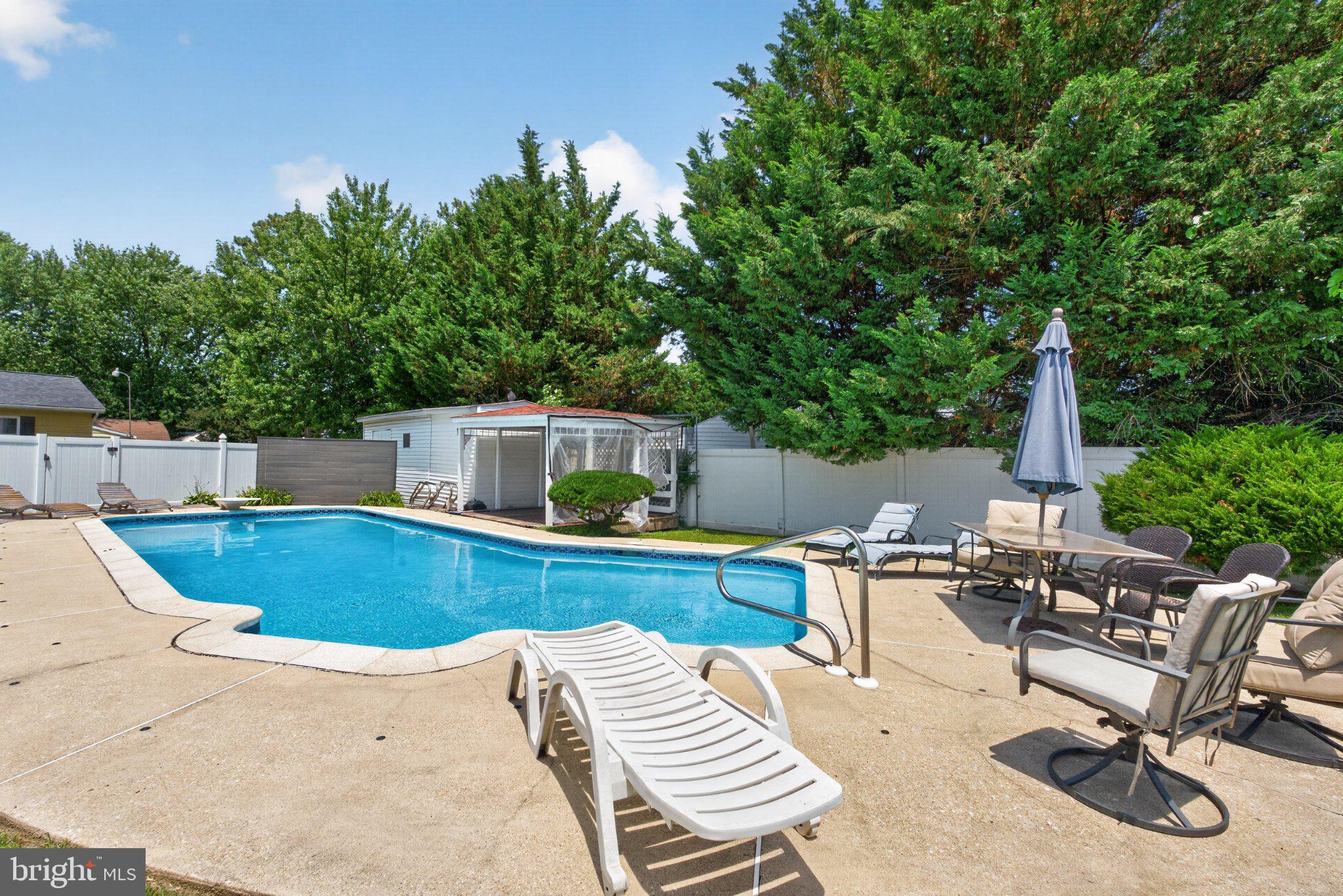 2858 Lodge Farm Road Baltimore, MD 21219 - Photo 46 of 49 Sunny oasis with inviting poolside.