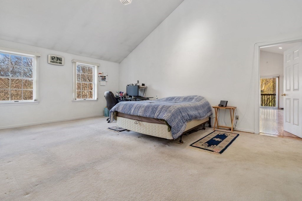 1 Hammersmith Drive Saugus, MA 01906 - Photo 17 of 39 a spacious bedroom with a bed and a window