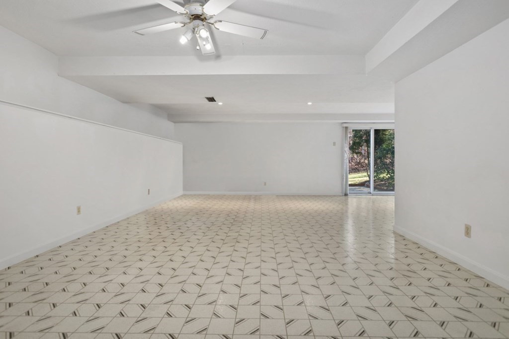 1 Hammersmith Drive Saugus, MA 01906 - Photo 20 of 39 wooden floor in an empty room with a window