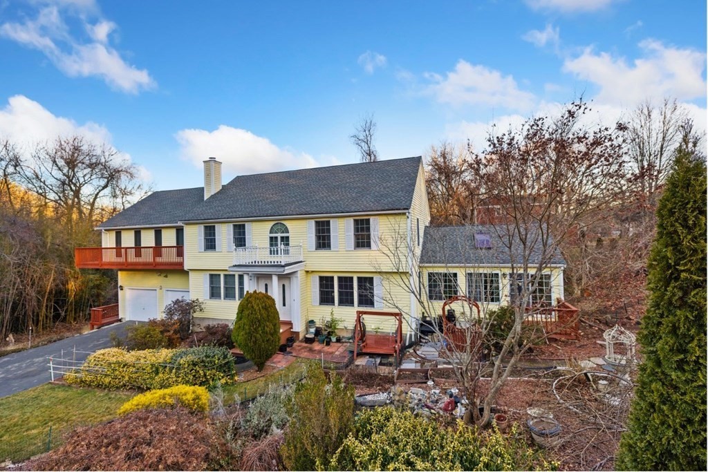 1 Hammersmith Drive Saugus, MA 01906 - Photo 2 of 39 a front view of a house with a yard and outdoor seating