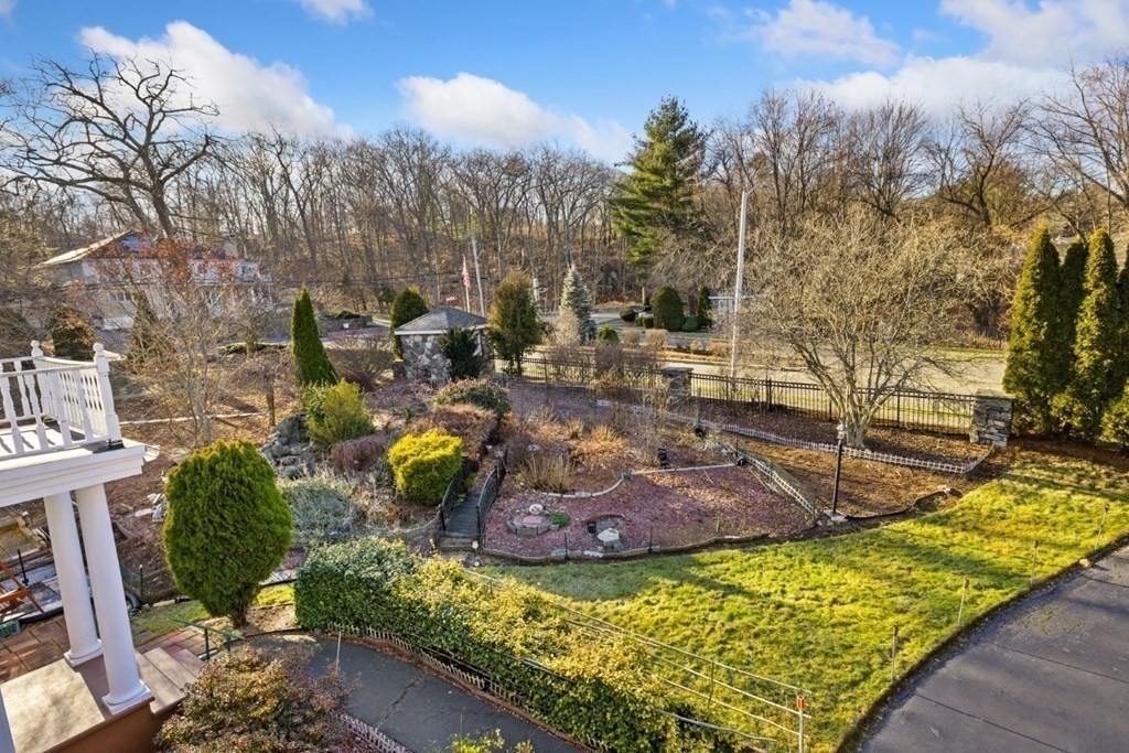 1 Hammersmith Drive Saugus, MA 01906 - Photo 23 of 39 a view of a backyard with sitting area