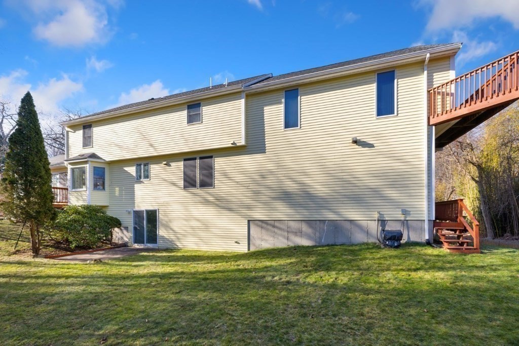 1 Hammersmith Drive Saugus, MA 01906 - Photo 26 of 39 a front view of house with yard