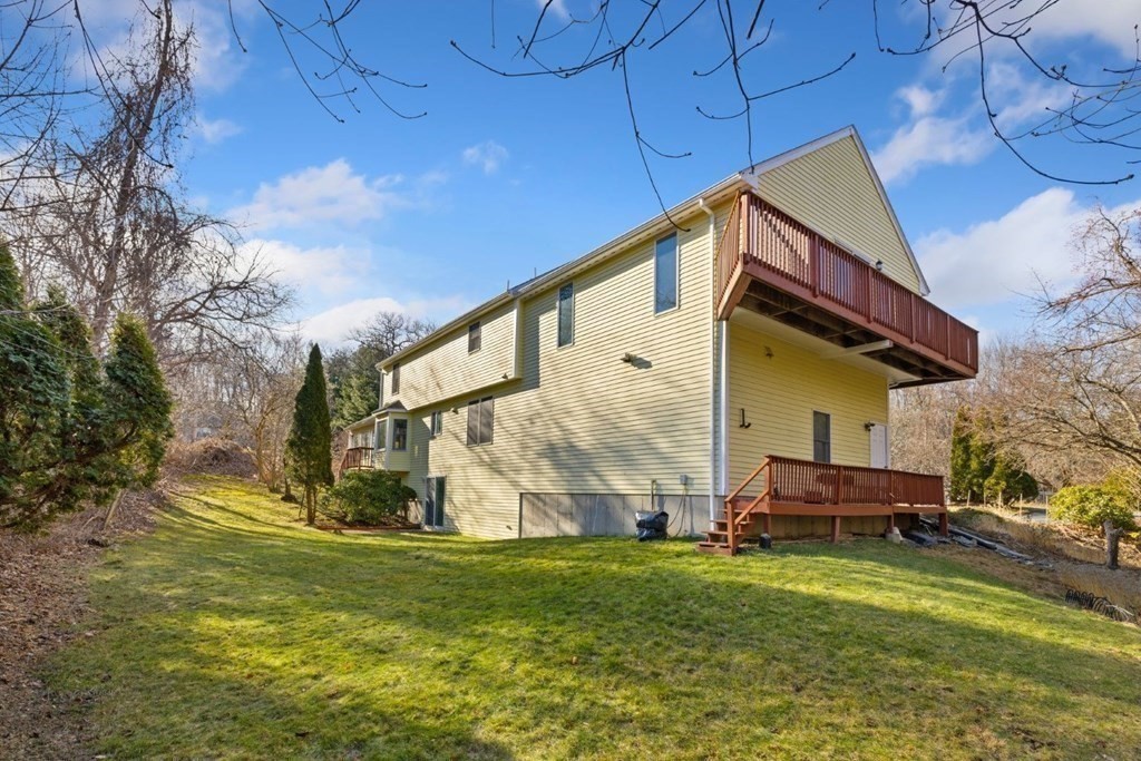 1 Hammersmith Drive Saugus, MA 01906 - Photo 28 of 39 a view of backyard of house