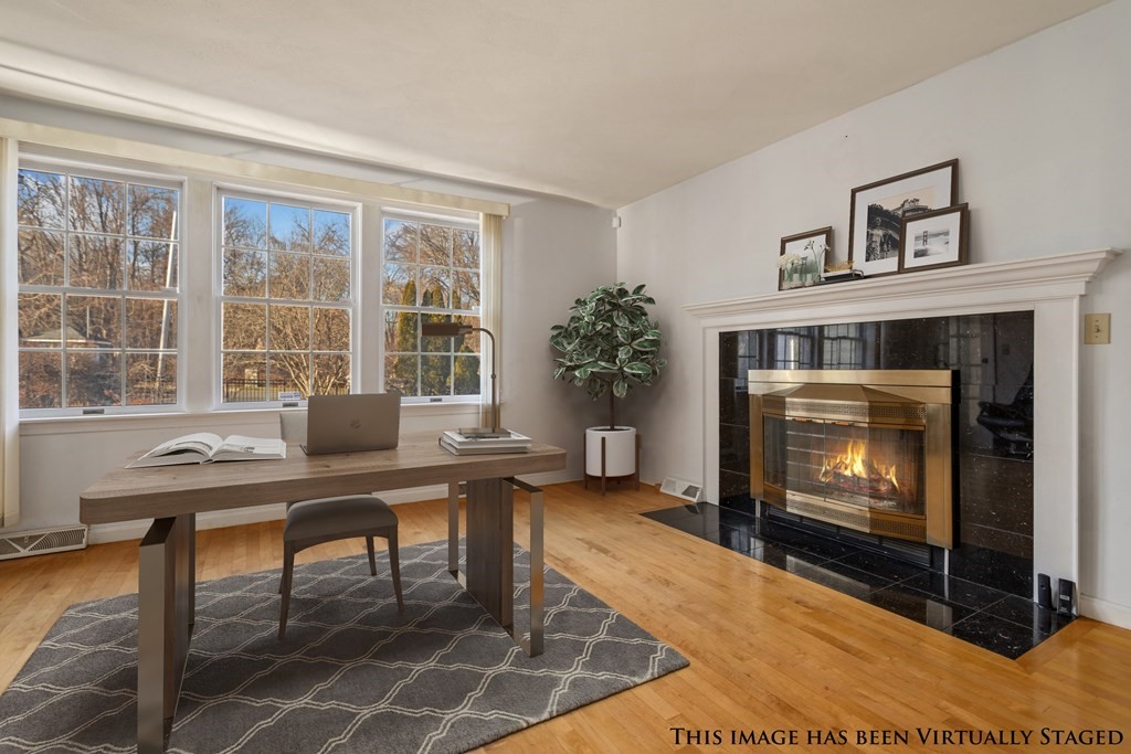 1 Hammersmith Drive Saugus, MA 01906 - Photo 36 of 39 a living room with furniture a window and a fireplace
