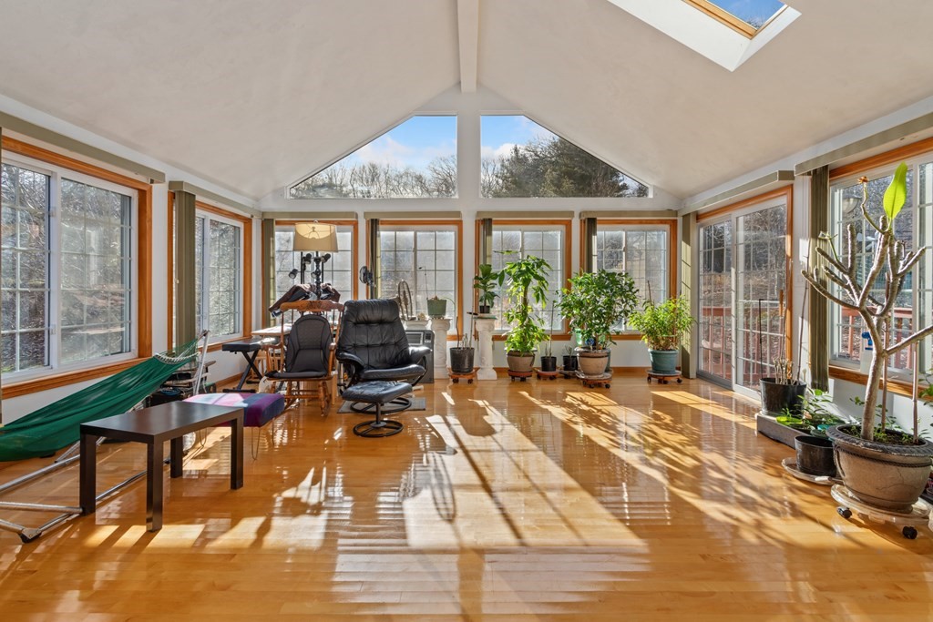 1 Hammersmith Drive Saugus, MA 01906 - Photo 38 of 39 a living room with patio furniture and a potted plant