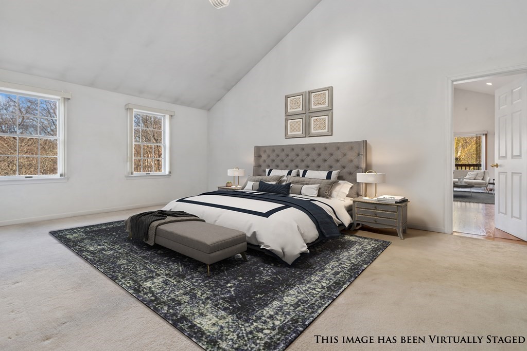 1 Hammersmith Drive Saugus, MA 01906 - Photo 39 of 39 a bedroom with a bed and wooden floor