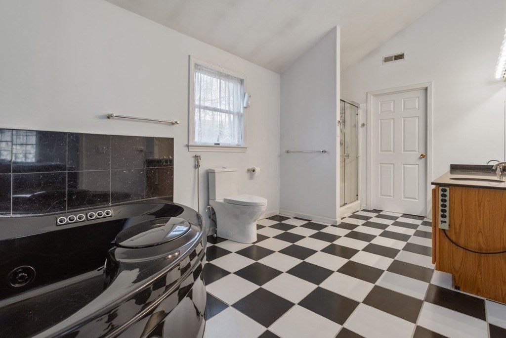 1 Hammersmith Drive Saugus, MA 01906 - Photo 10 of 39 a bedroom with a bed and a window