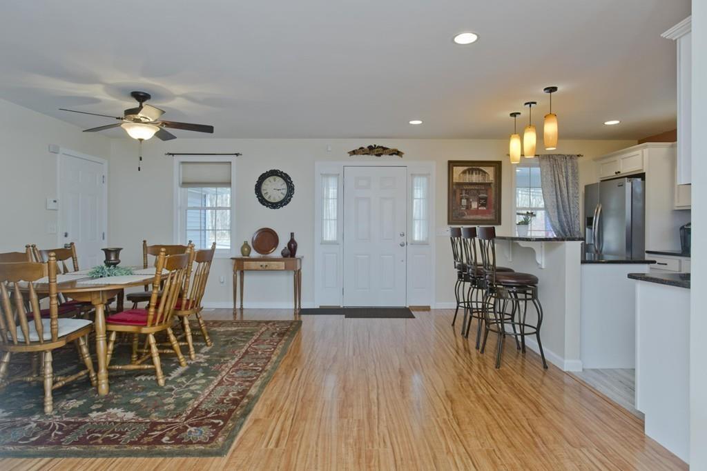445 Monson Road Wilbraham, MA 01095 - Photo 18 of 42 a view of a dining room with furniture and wooden floor