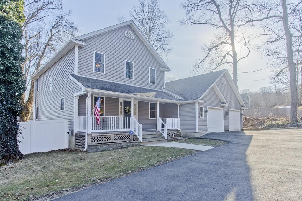445 Monson Road Wilbraham, MA 01095 - Photo 3 of 42 a front view of a house with garden