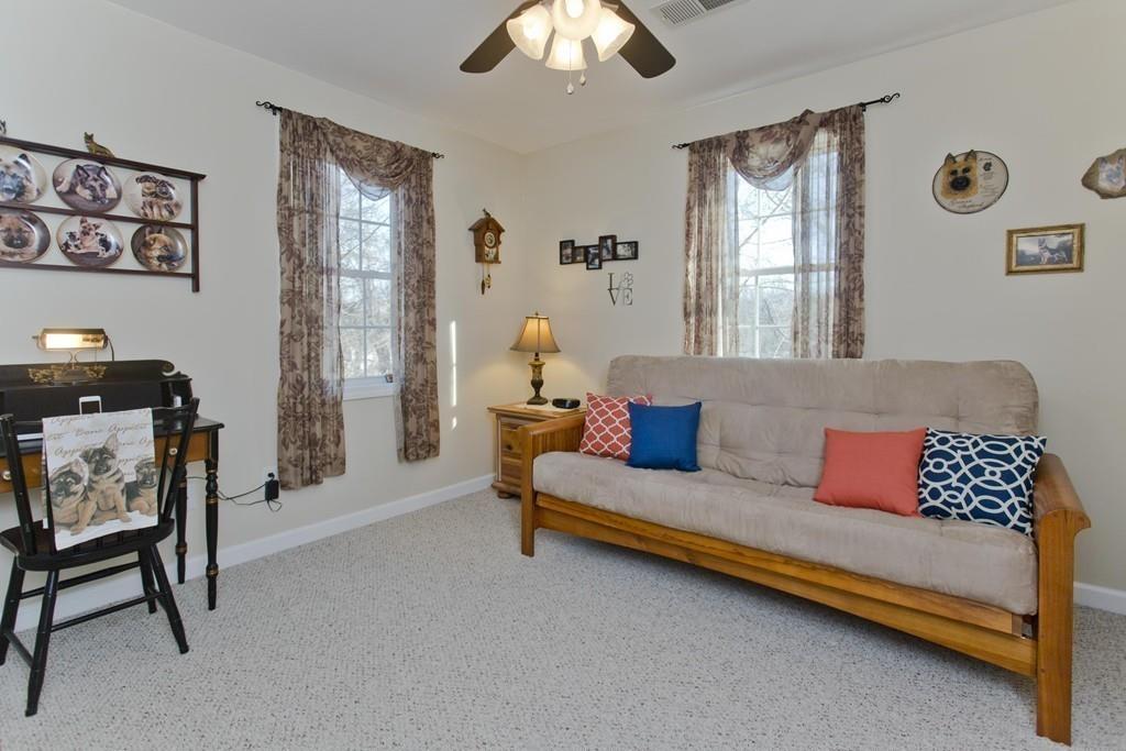 445 Monson Road Wilbraham, MA 01095 - Photo 33 of 42 a living room with furniture and a window
