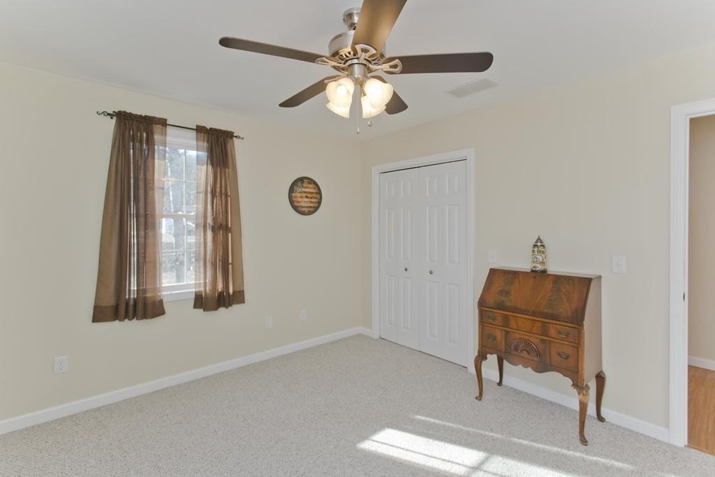 445 Monson Road Wilbraham, MA 01095 - Photo 39 of 42 a living room with furniture and a window
