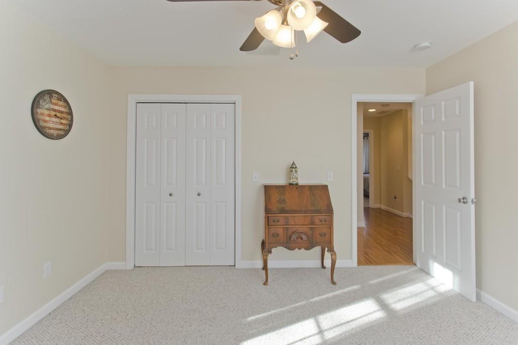445 Monson Road Wilbraham, MA 01095 - Photo 40 of 42 a view of a livingroom with furniture and chandelier fan