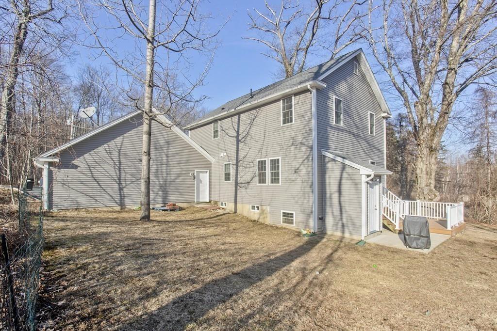 445 Monson Road Wilbraham, MA 01095 - Photo 42 of 42 a view of a house with snow on the road