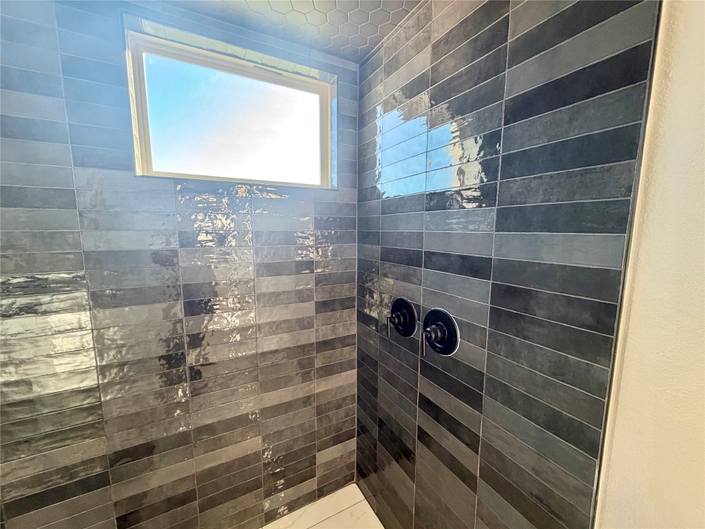 500 Bloomington Loop Hutto, TX 78634 - Photo 13 of 18 a bathroom with a shower