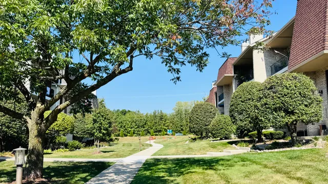 a view of an empty room with a fireplace