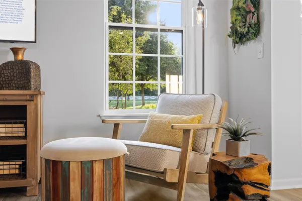 a workspace with furniture and a window