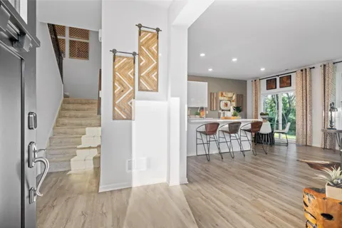 a living room with furniture and a table