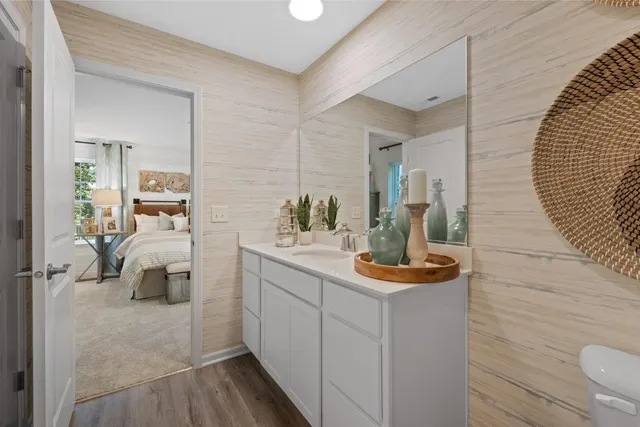 a bathroom with a sink and mirror