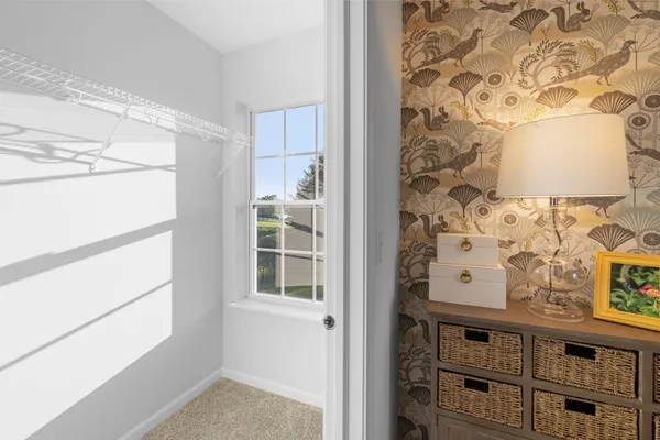 a bathroom with a granite countertop sink a toilet and a bathtub