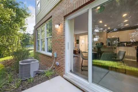 a view of a house with a yard and plants