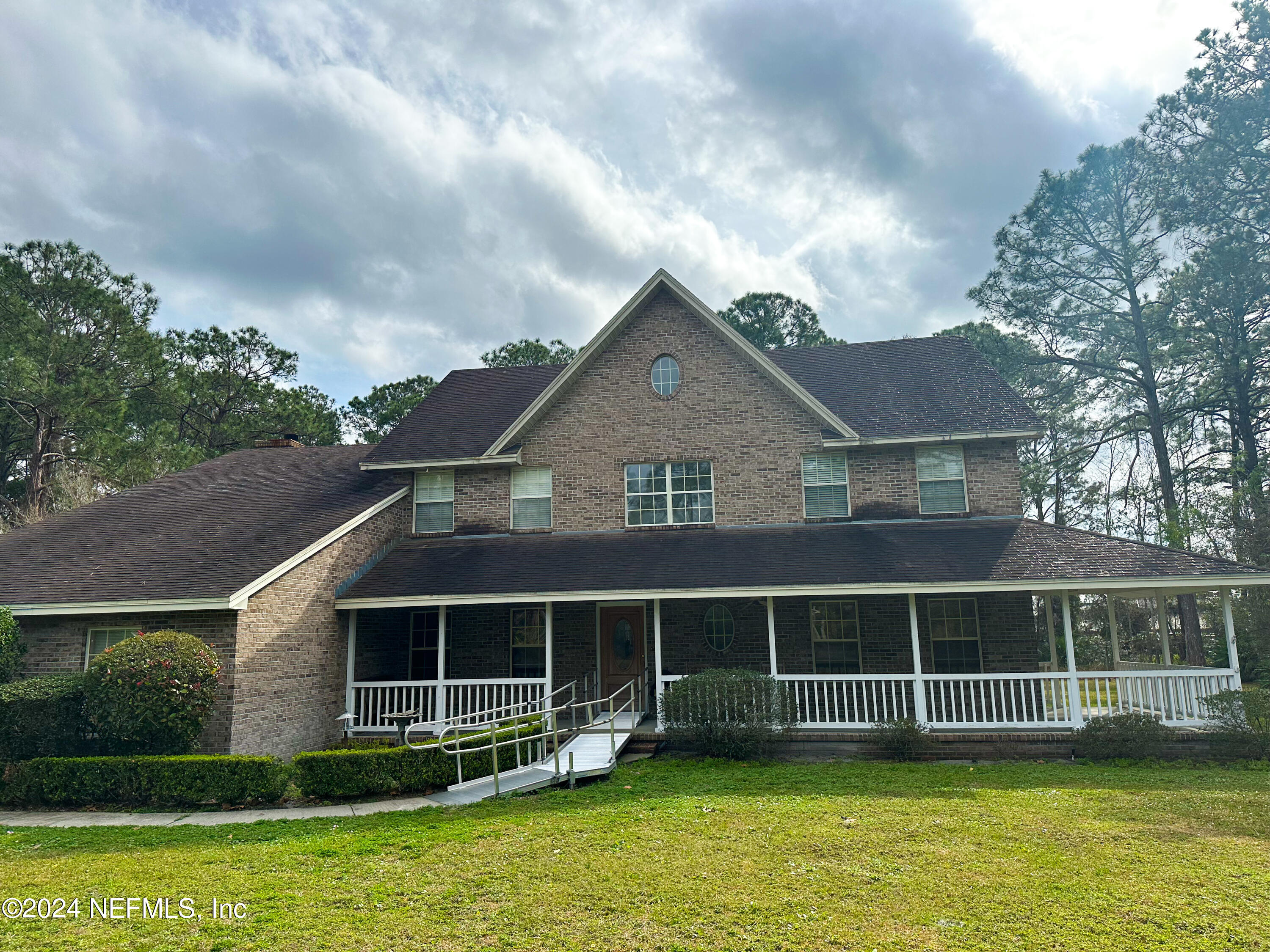 10601 Quail Ridge Drive Ponte Vedra, FL 32081 - Photo 1 of 17 a view of a house with a garden