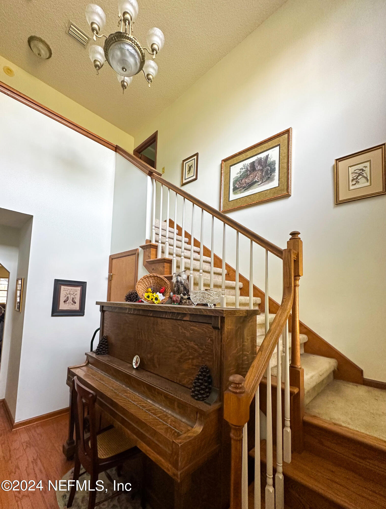 10601 Quail Ridge Drive Ponte Vedra, FL 32081 - Photo 11 of 17 a view of entryway and hall with wooden floor