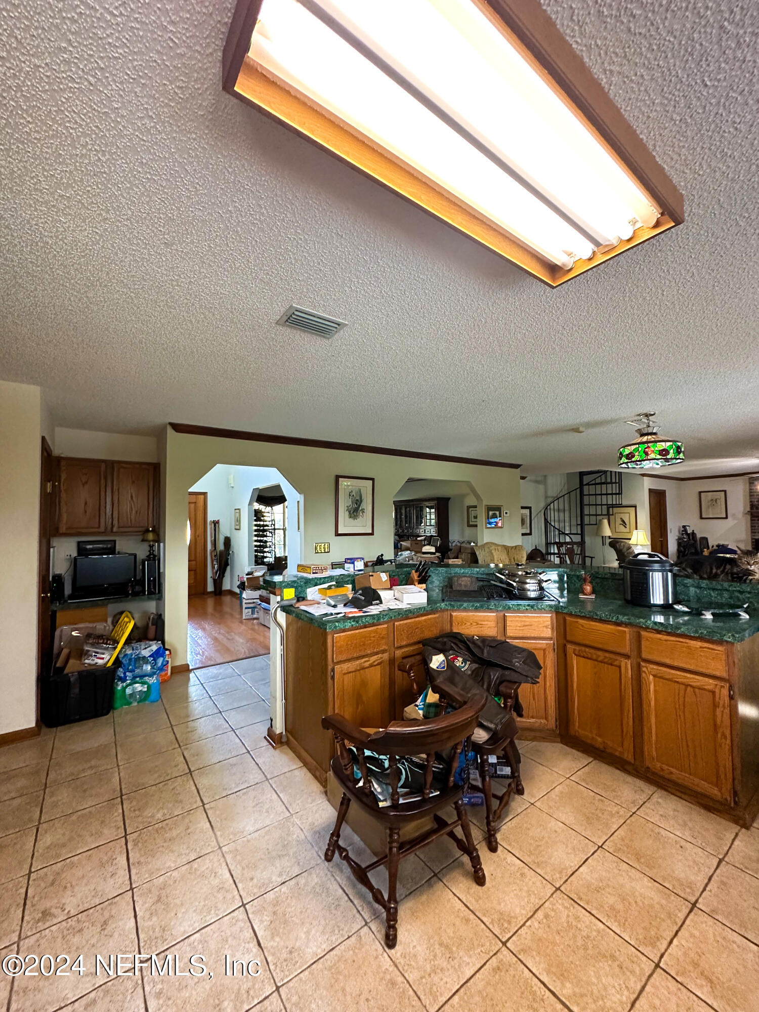 10601 Quail Ridge Drive Ponte Vedra, FL 32081 - Photo 14 of 17 a kitchen with stainless steel appliances granite countertop a sink and a stove