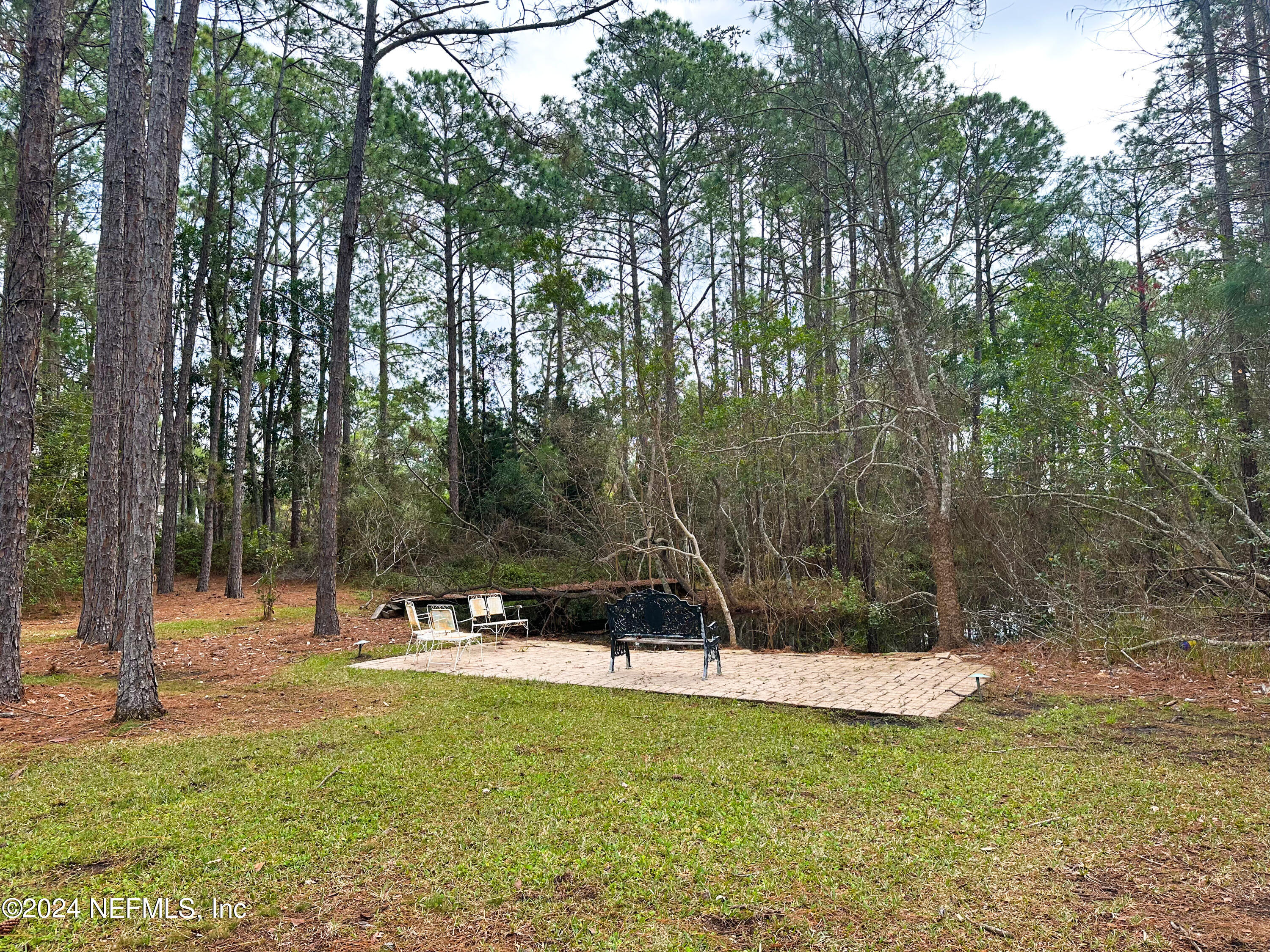 10601 Quail Ridge Drive Ponte Vedra, FL 32081 - Photo 10 of 17 a view of a park with large trees