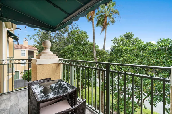 a view of balcony with furniture