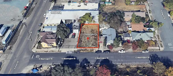 an aerial view of waterside residential building