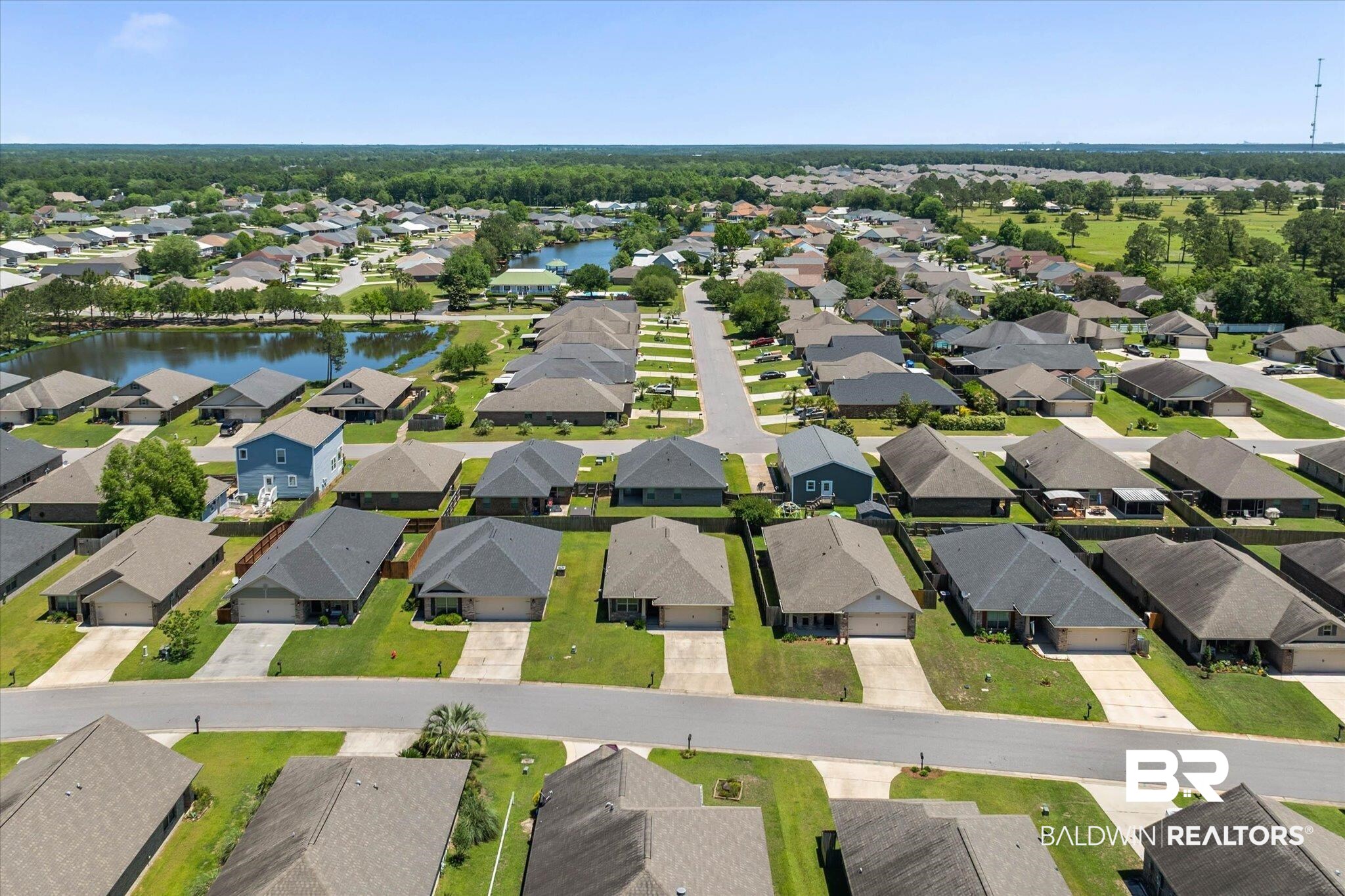 22420 Respite Lane Foley, AL 36535 - Photo 26 of 35 Aerial perspective showcasing a residential community with numerous single-story homes featuring attached garages