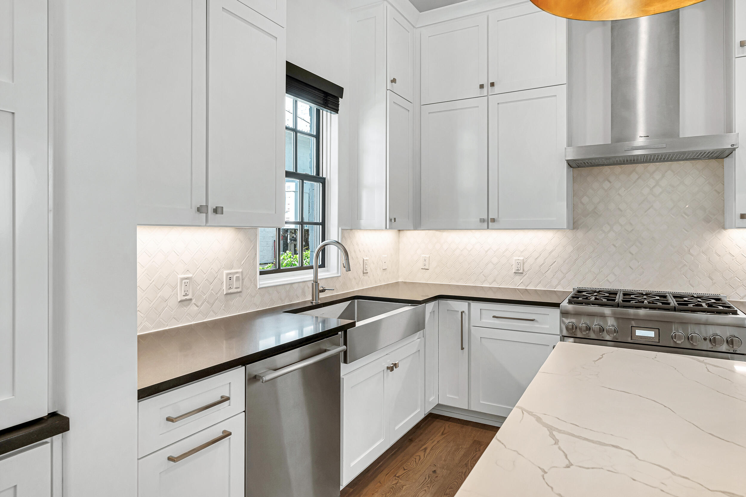 95 Tyler Santa Rosa Beach, FL 32459 - Photo 15 of 58 a kitchen with granite countertop white cabinets and a sink