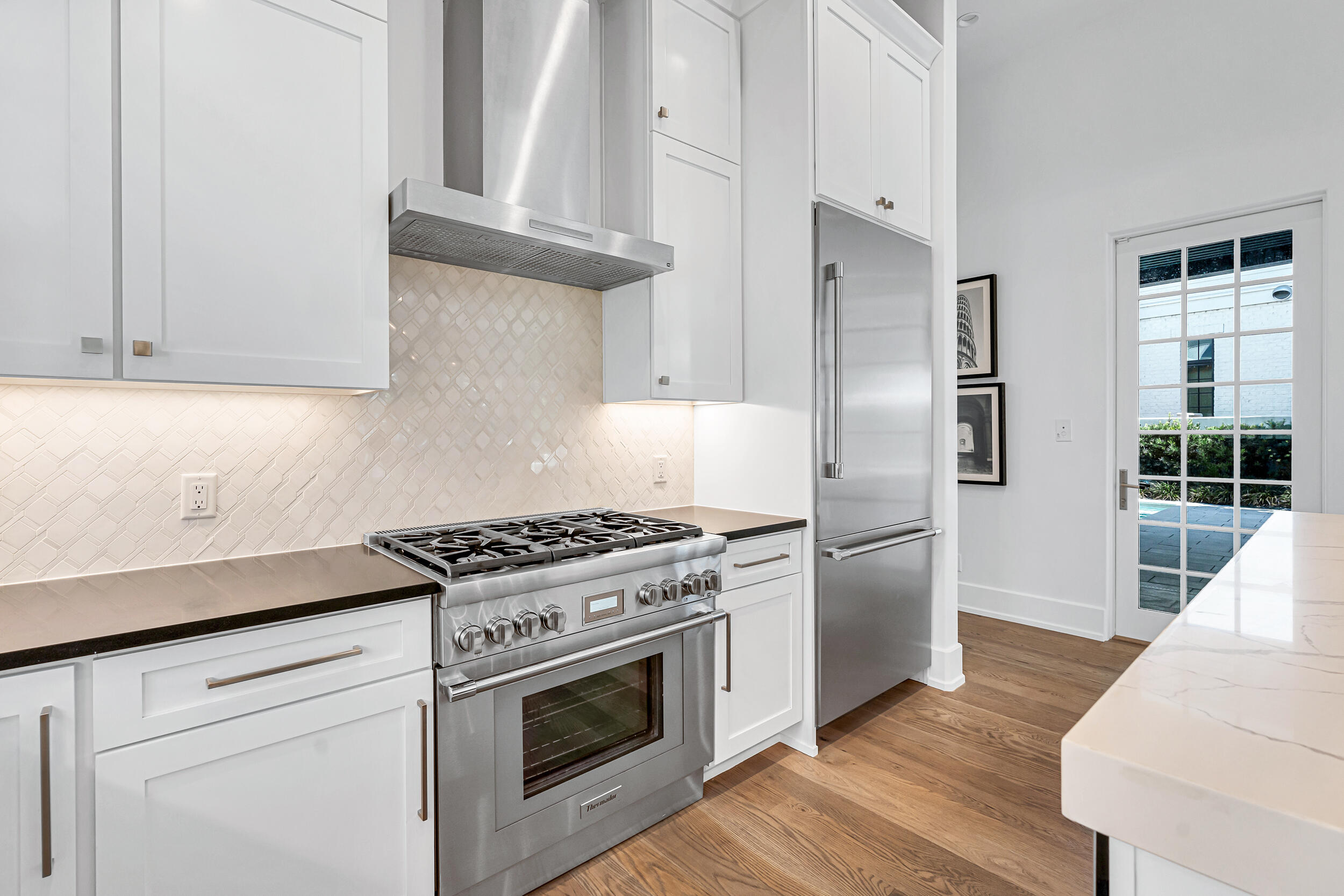 95 Tyler Santa Rosa Beach, FL 32459 - Photo 16 of 58 a kitchen with cabinets and steel stainless steel appliances
