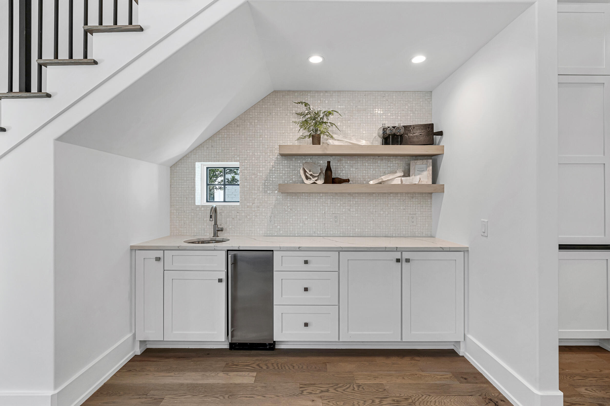 95 Tyler Santa Rosa Beach, FL 32459 - Photo 20 of 58 a view of cabinets a wooden floor and windows in a room