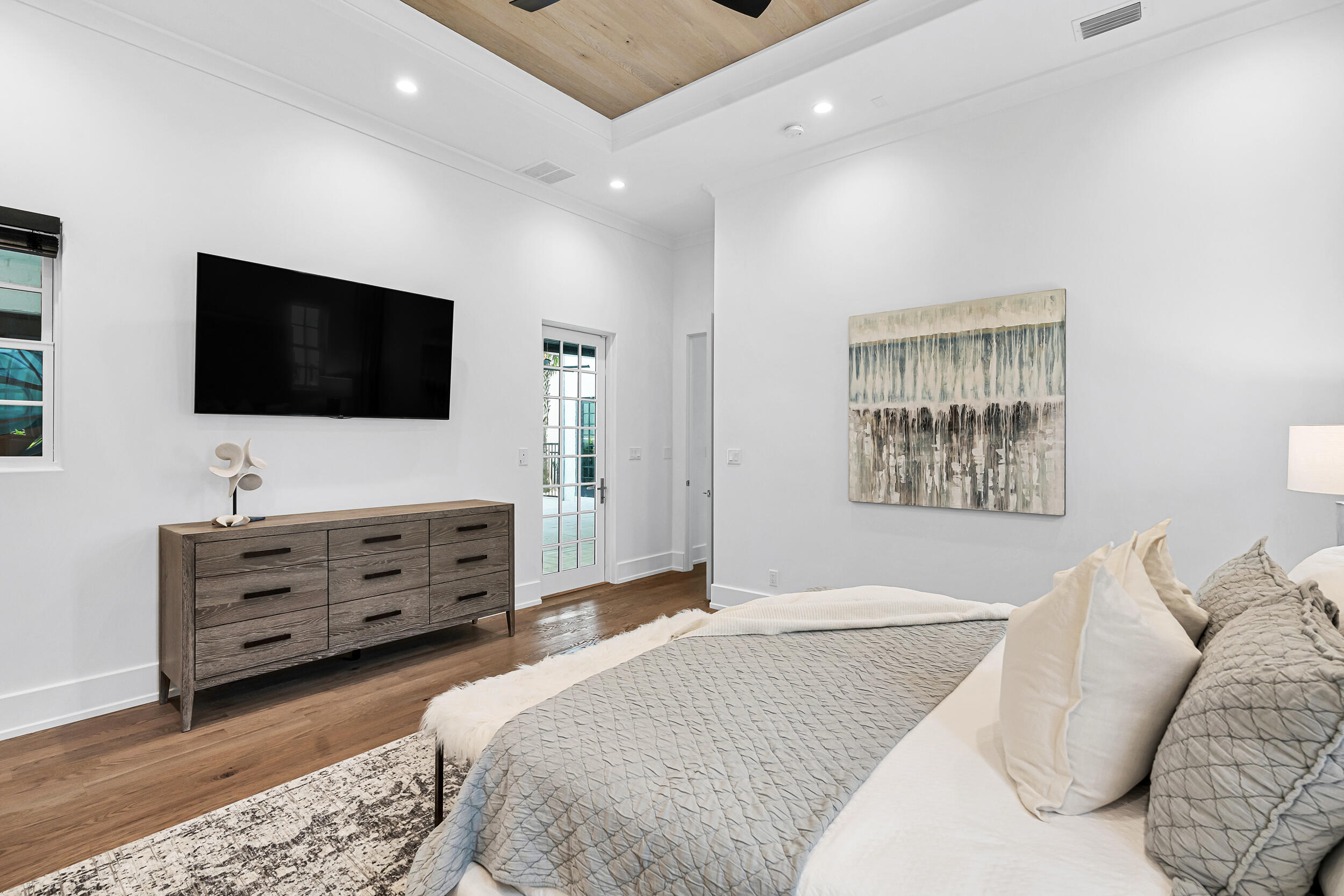 95 Tyler Santa Rosa Beach, FL 32459 - Photo 26 of 58 a bedroom with a bed and a flat screen tv