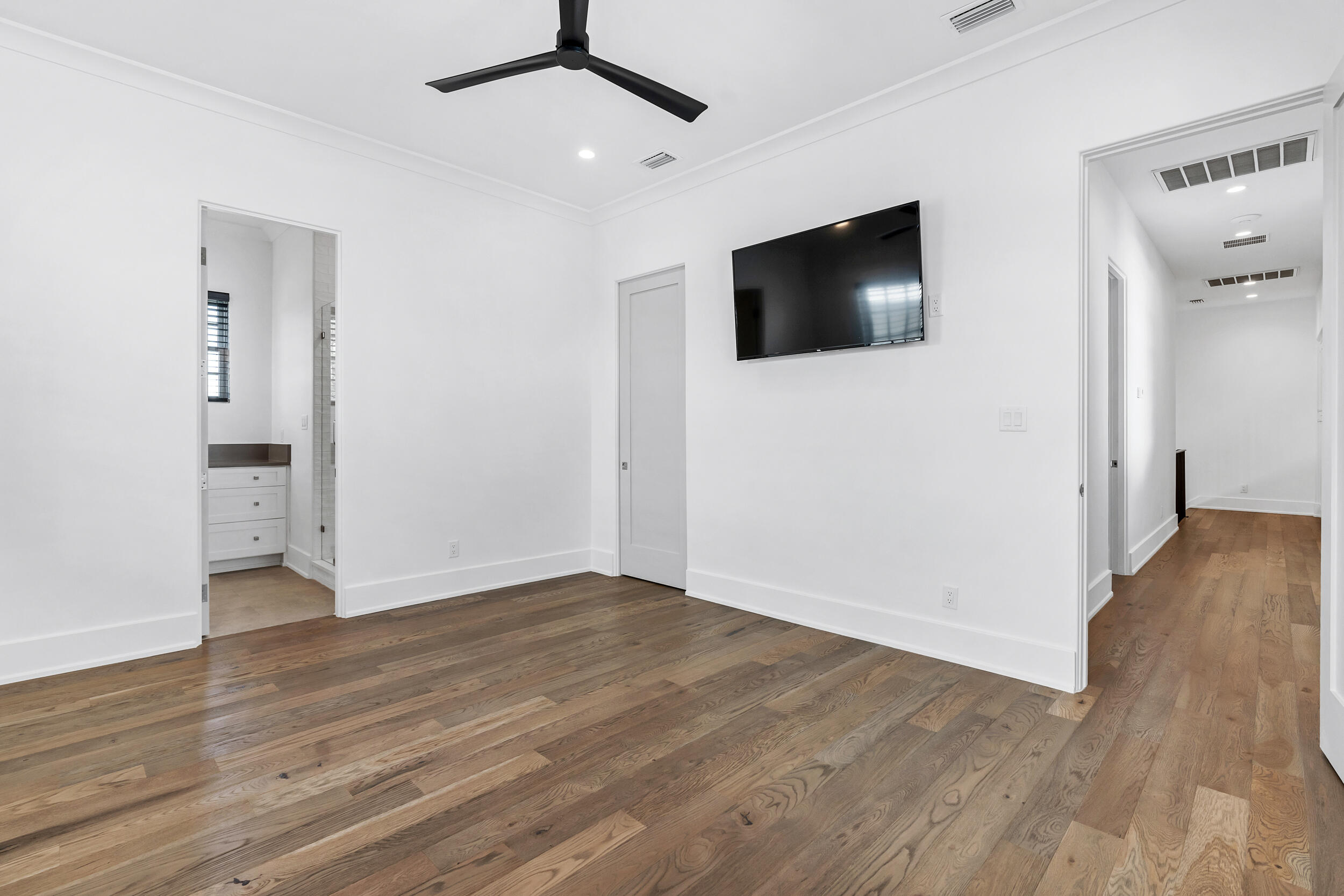 95 Tyler Santa Rosa Beach, FL 32459 - Photo 36 of 58 an empty room with wooden floor and windows
