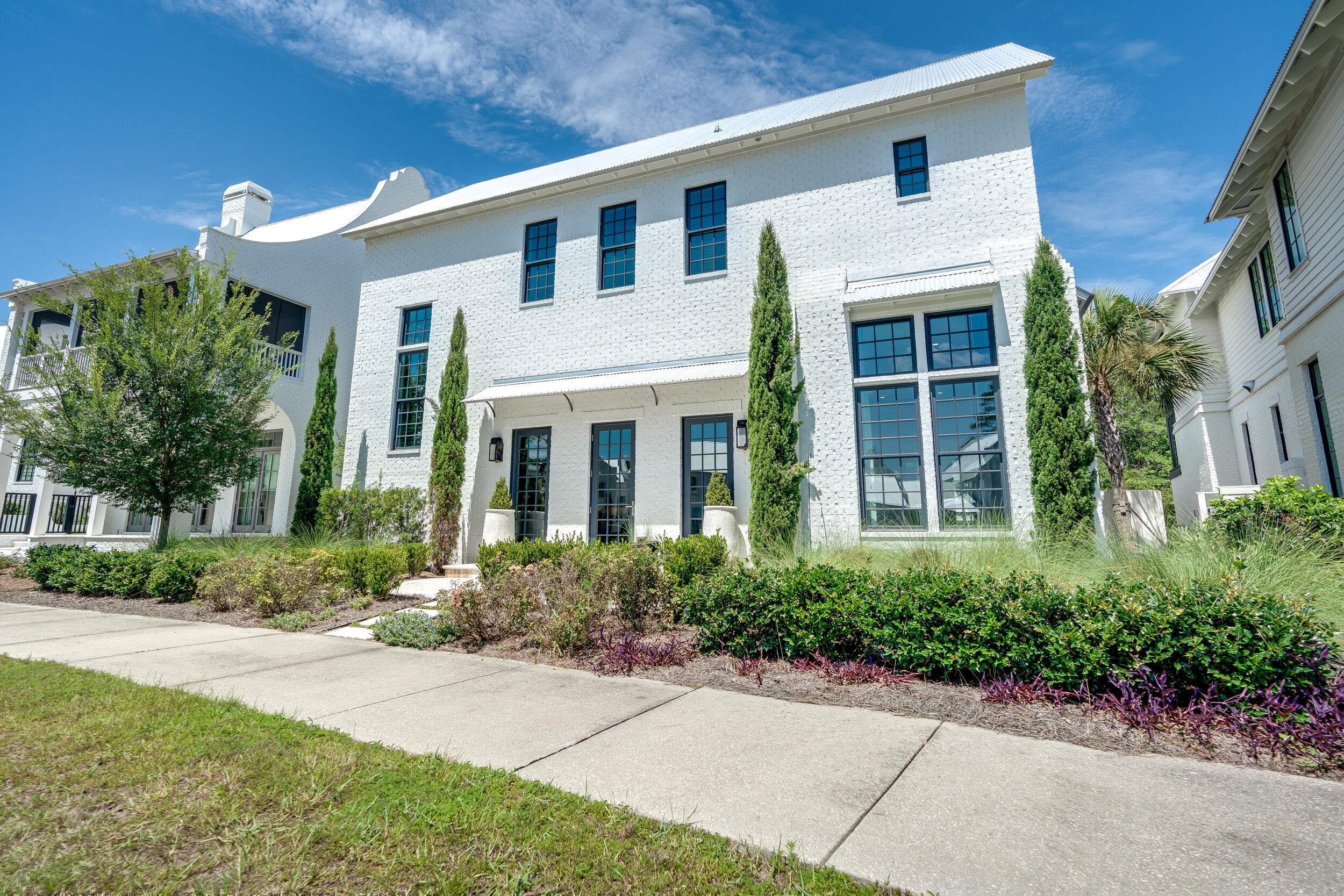 95 Tyler Santa Rosa Beach, FL 32459 - Photo 46 of 58 a front view of a house with garden