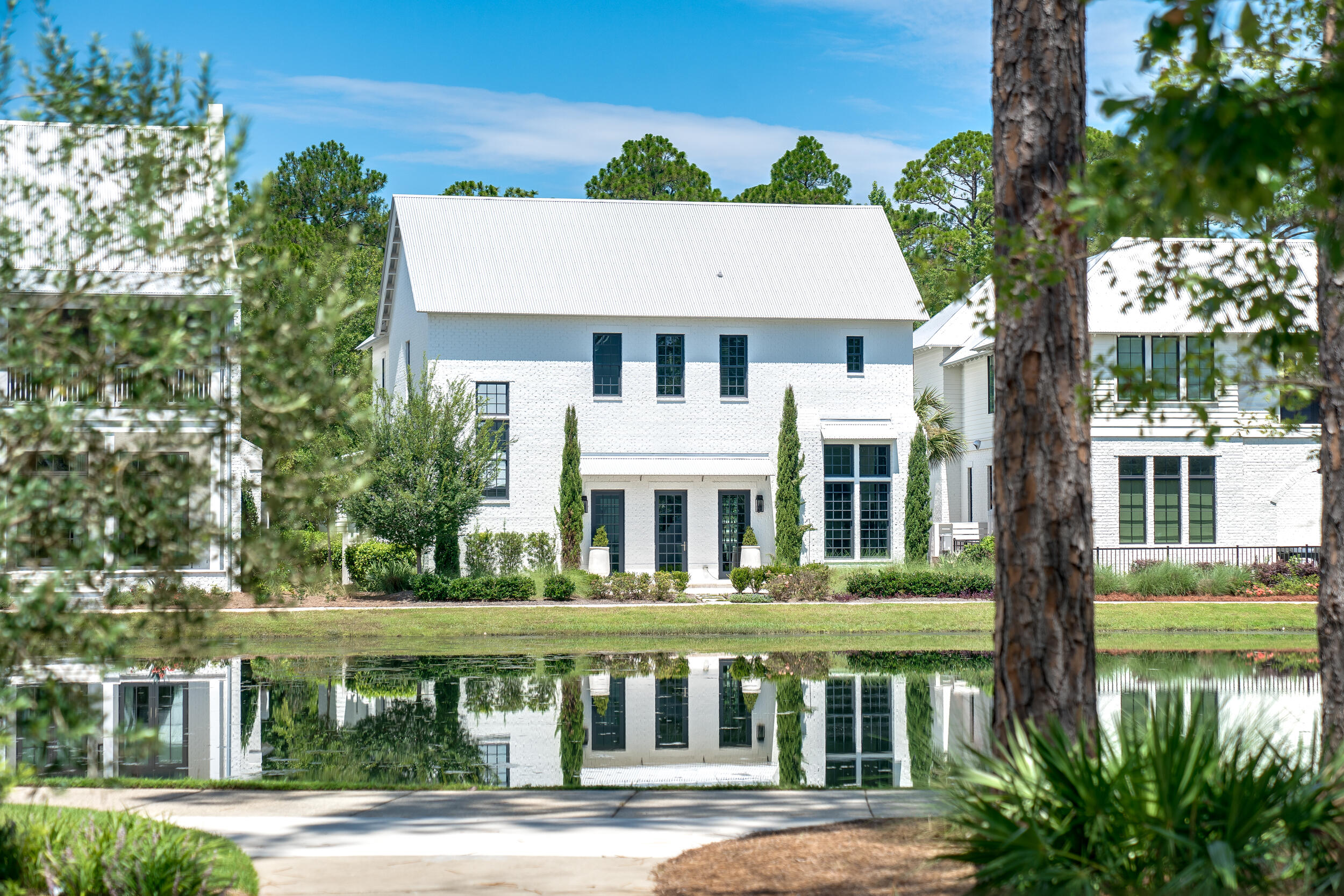 95 Tyler Santa Rosa Beach, FL 32459 - Photo 47 of 58 front view of a building with a garden