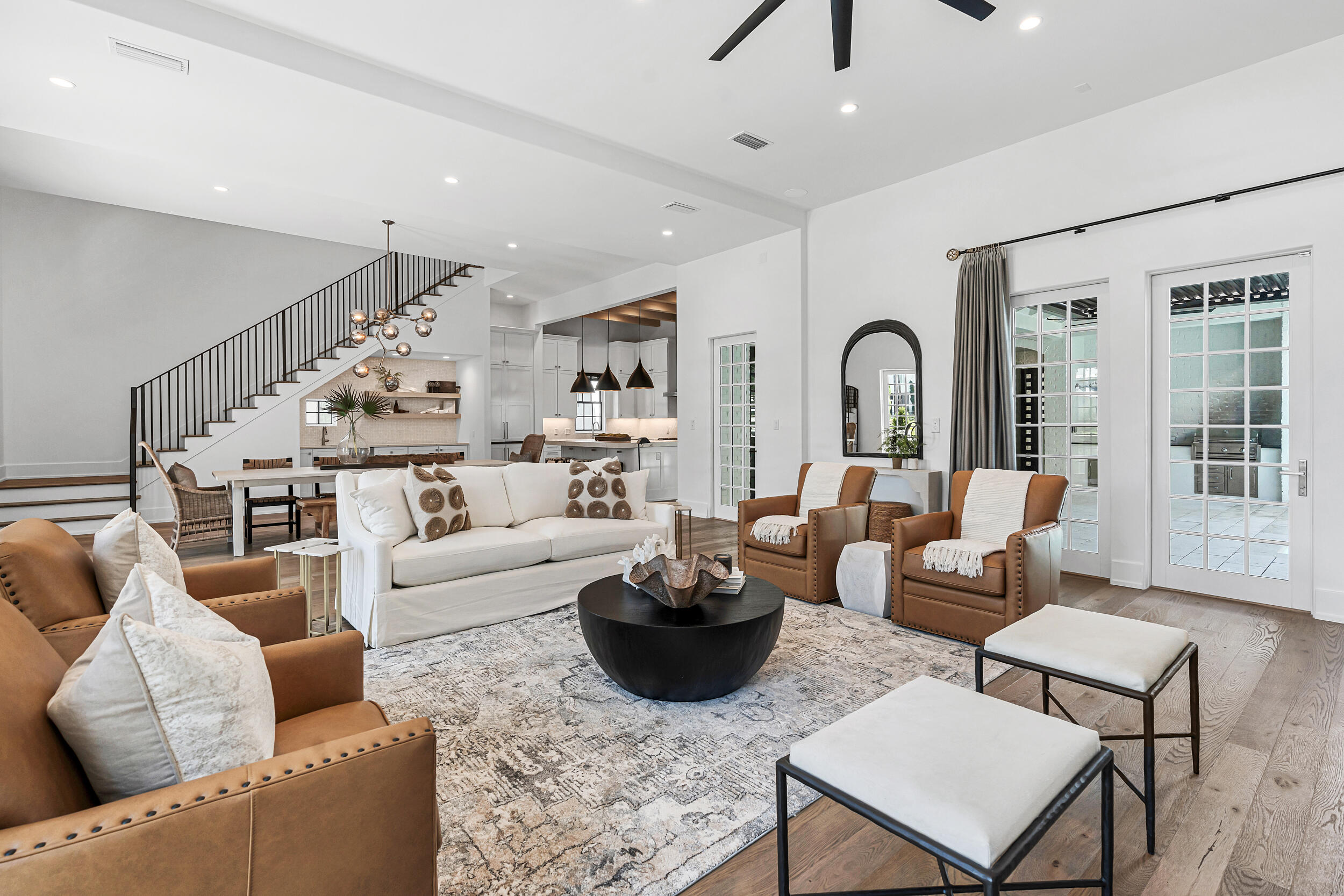 95 Tyler Santa Rosa Beach, FL 32459 - Photo 5 of 58 a living room with furniture a rug and a chandelier