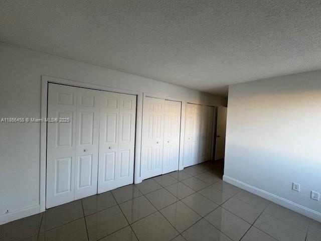 6950 Miami Gardens Drive, Unit 2508 Hialeah, FL 33015 - Photo 14 of 27 a view of an empty room and entryway