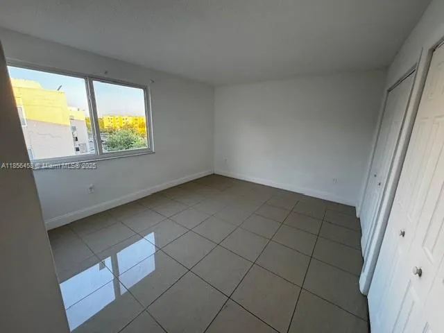 a view of a utility room with door