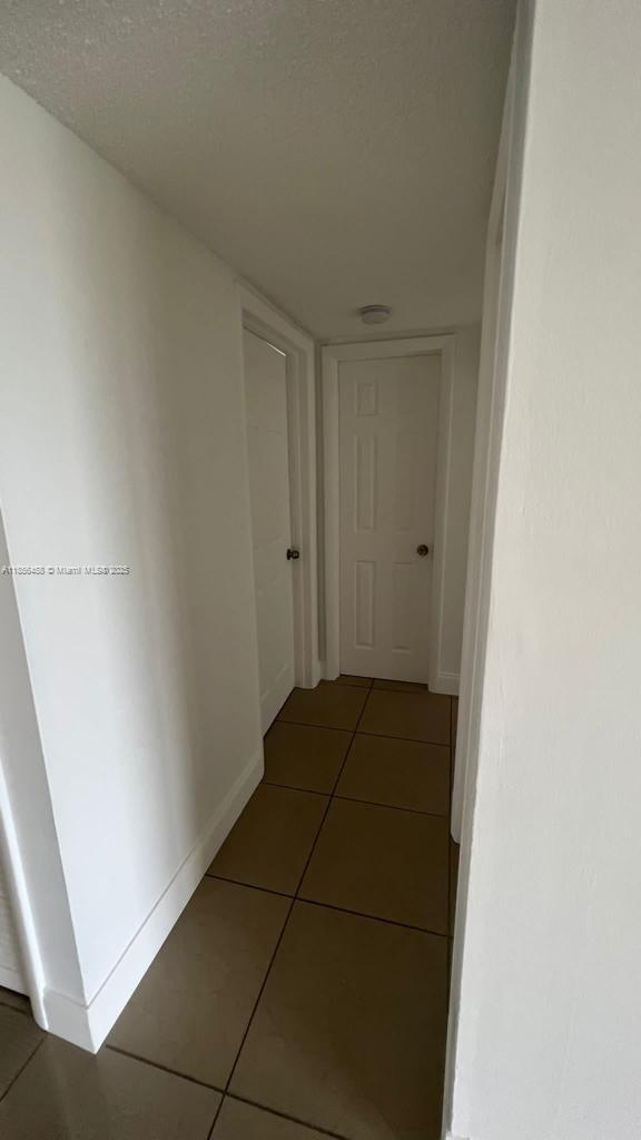 6950 Miami Gardens Drive, Unit 2508 Hialeah, FL 33015 - Photo 17 of 27 a view of an empty room