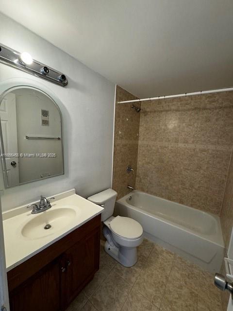 6950 Miami Gardens Drive, Unit 2508 Hialeah, FL 33015 - Photo 9 of 27 a bathroom with a double vanity sink toilet and shower