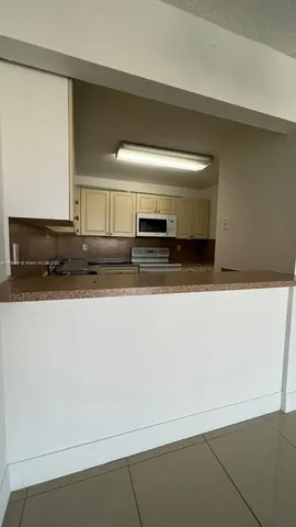 an empty room with a bathroom