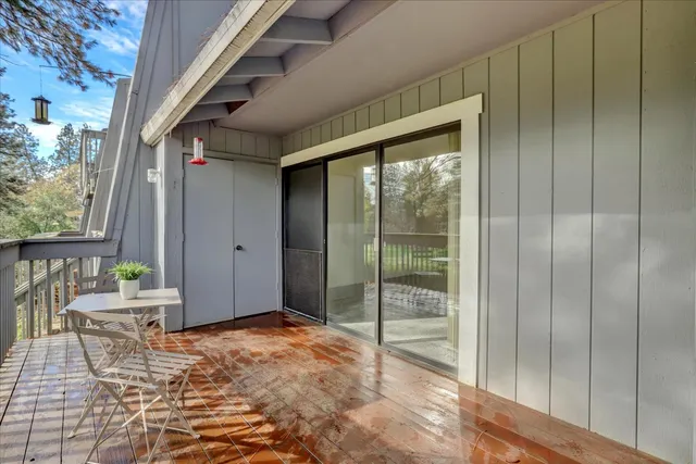 an aerial view of residential house with outdoor space and swimming pool