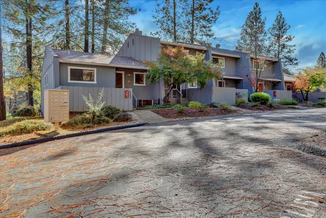 a view of a city with mountains in the background