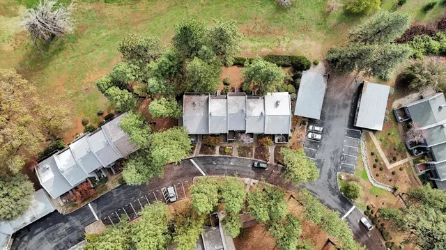 an aerial view of a house with a garden